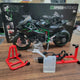 RC motorcycle box contents - remote, stand and accessories